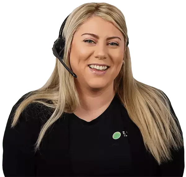 Smiling customer service representative wearing a headset, representing Environ Drainage Services, ready to assist with emergency drain services for stadiums and event spaces.